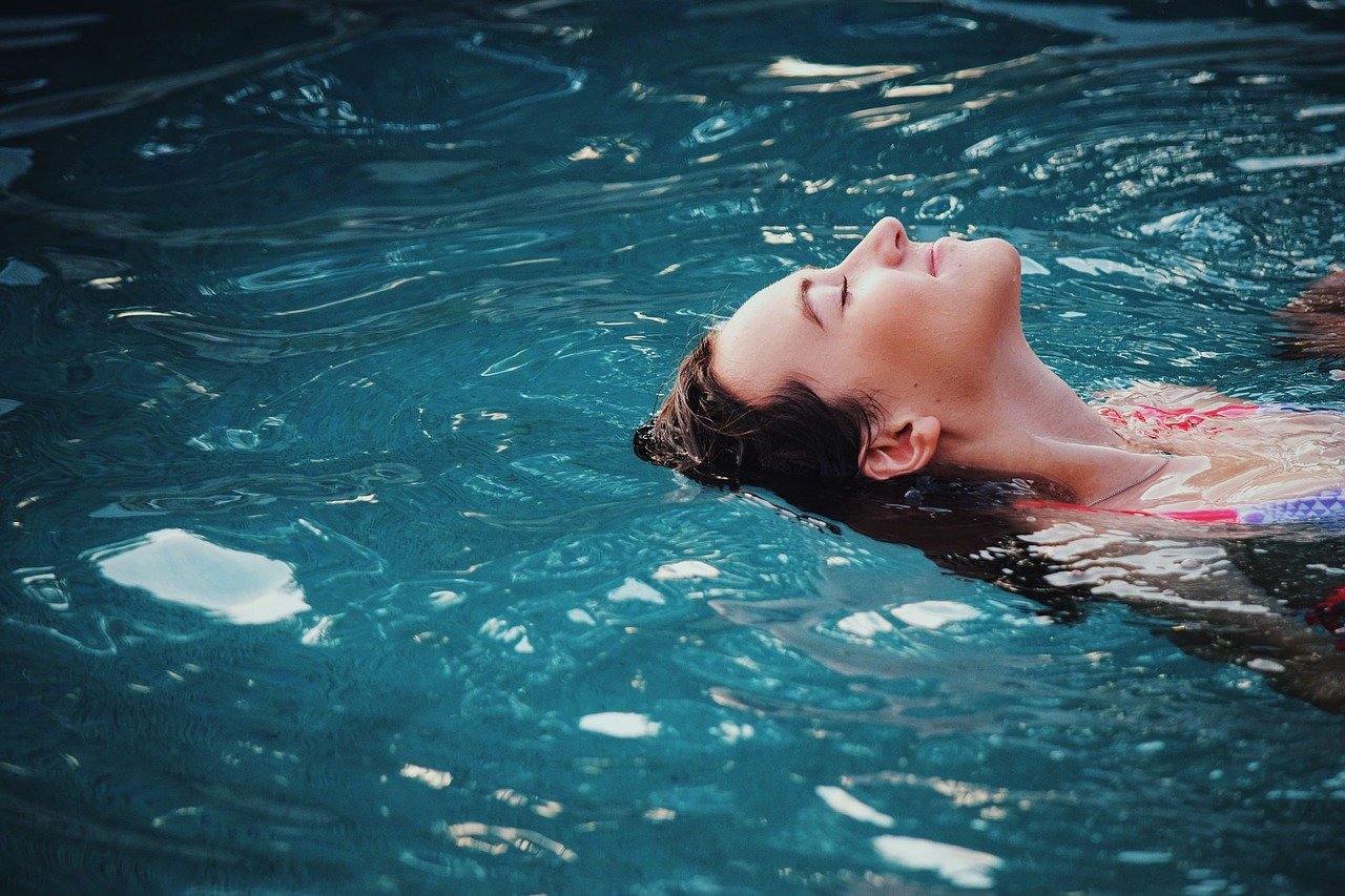 woman having relax in the pool