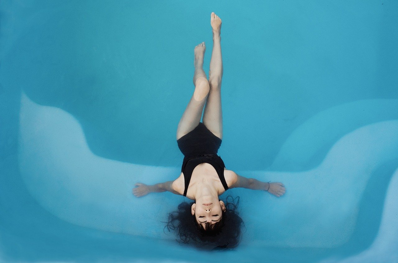 woman relaxing in the pool